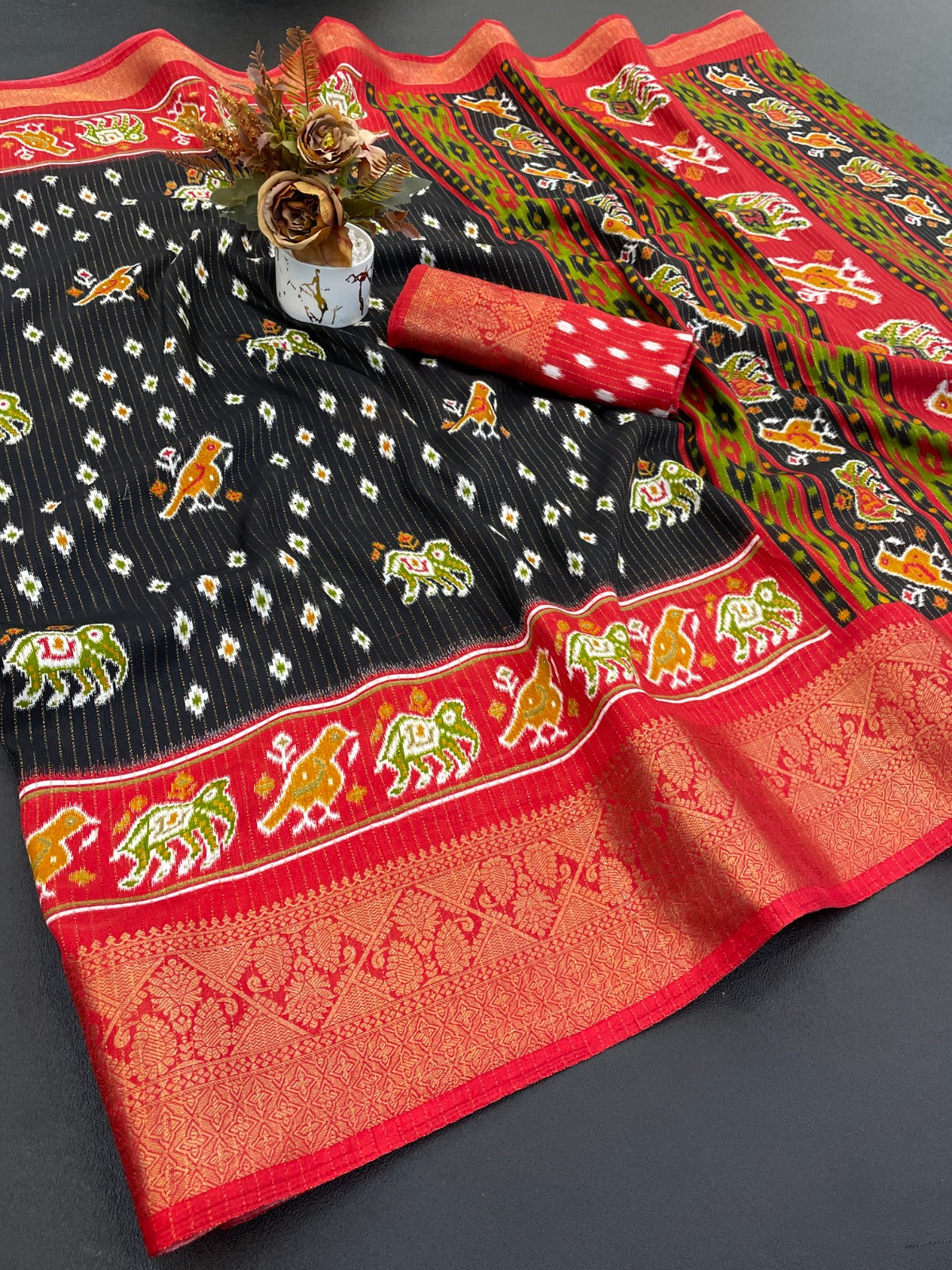 Patola Style Printed Saree with Traditional Elephant & Bird Motif Border and Designer Pallu-black