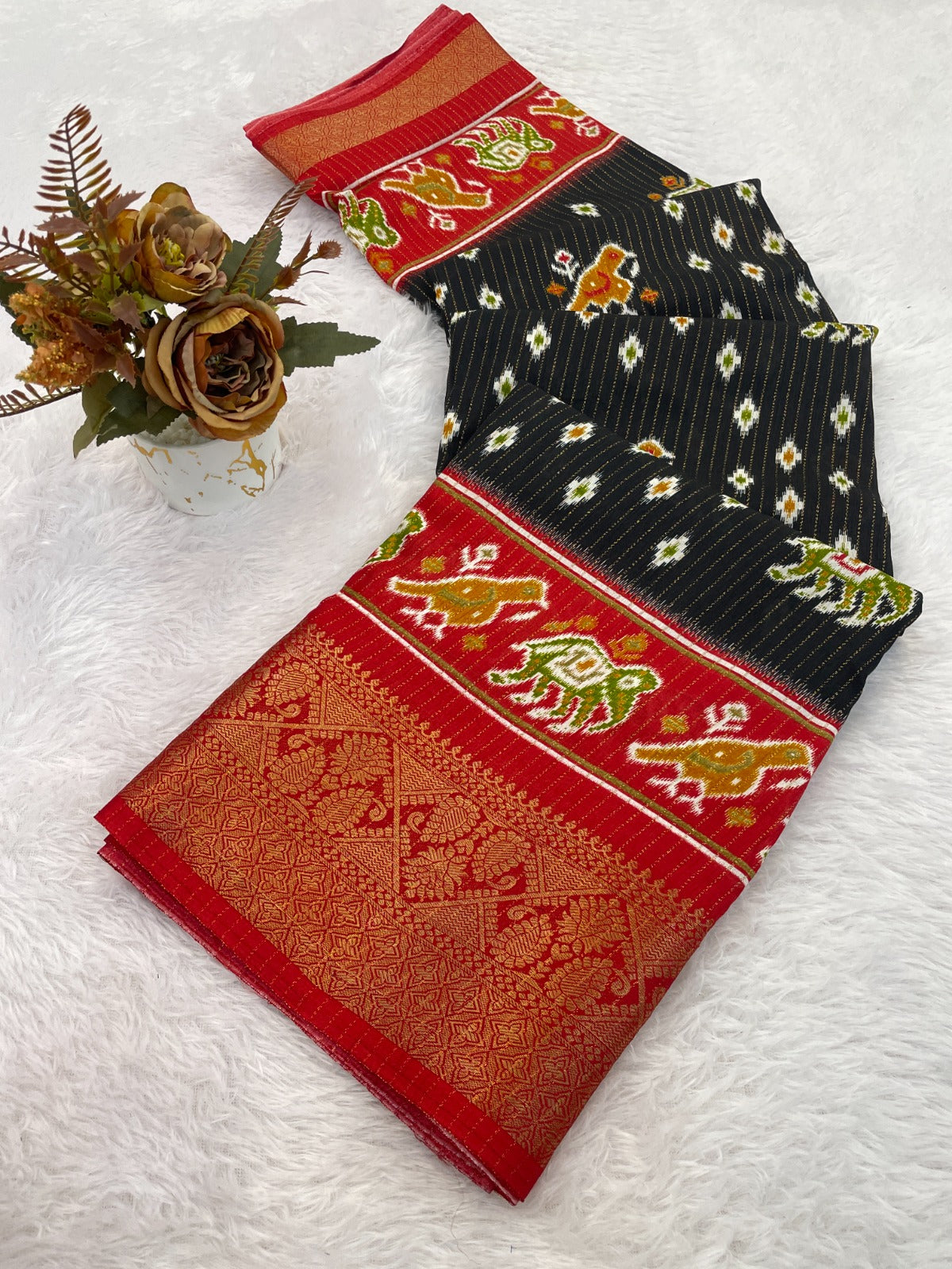 Patola Style Printed Saree with Traditional Elephant & Bird Motif Border and Designer Pallu-black