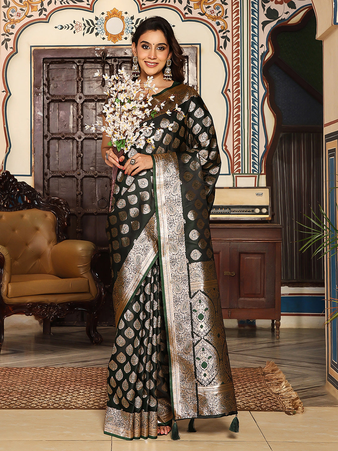 Bottelgreen woven kanjivaram soft silk saree with blouse piece