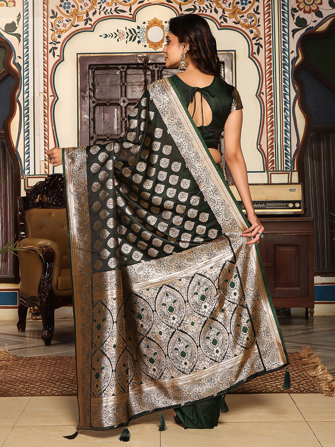Bottelgreen woven kanjivaram soft silk saree with blouse piece
