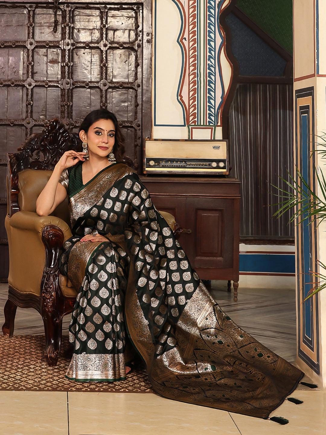 Bottelgreen woven kanjivaram soft silk saree with blouse piece