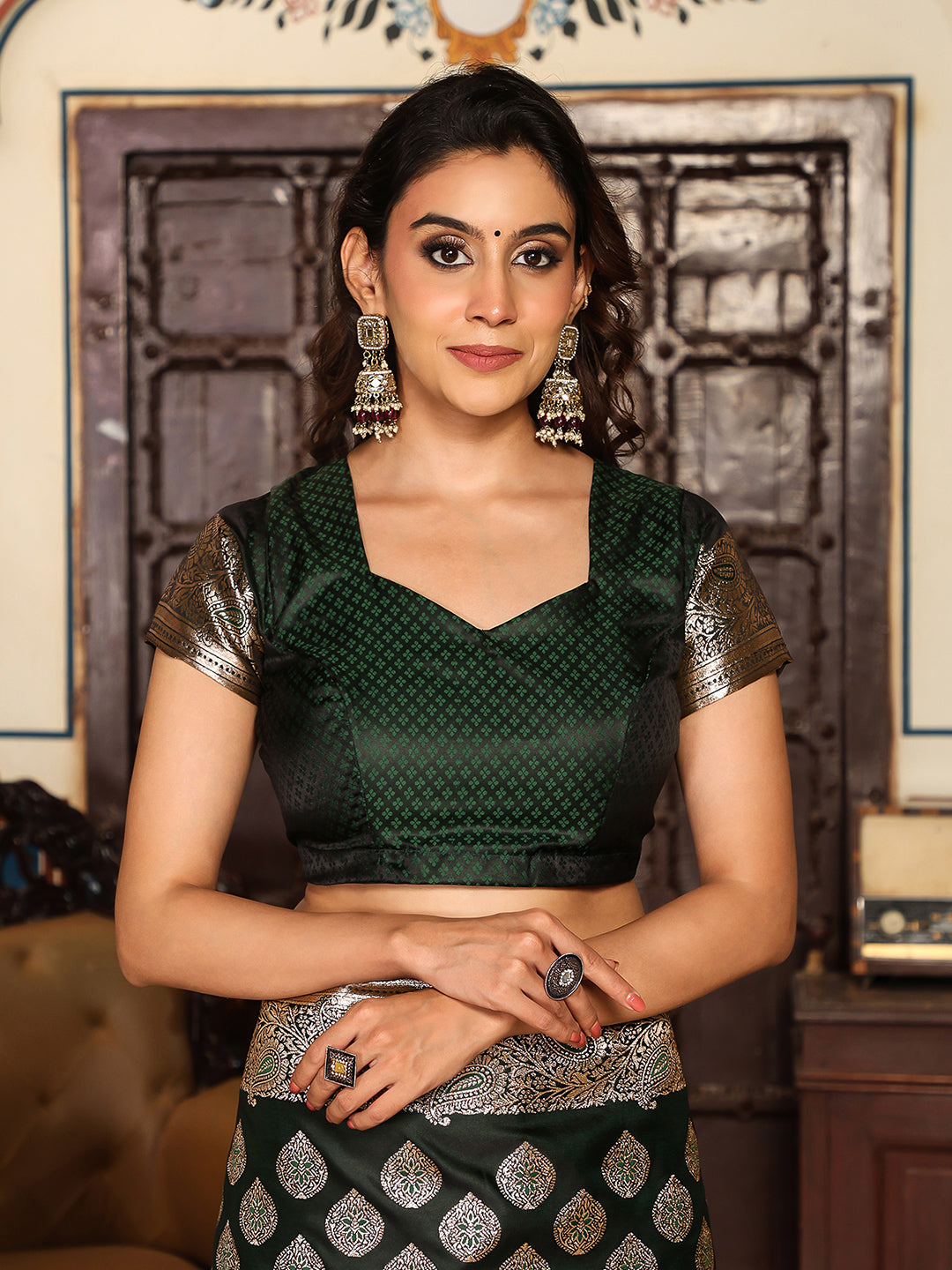 Bottelgreen woven kanjivaram soft silk saree with blouse piece