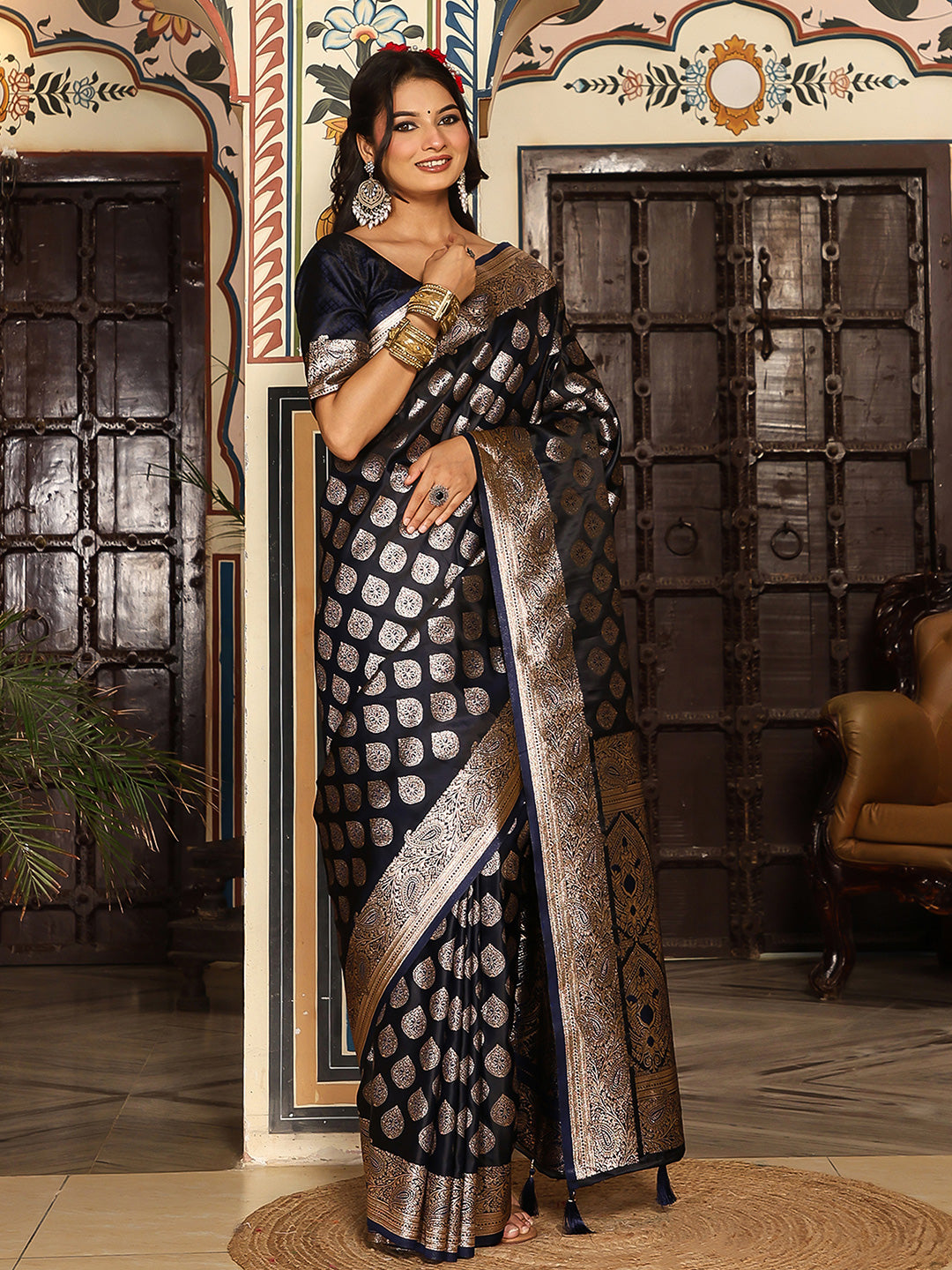 Navyblue woven kanjivaram soft silk saree with blouse piece