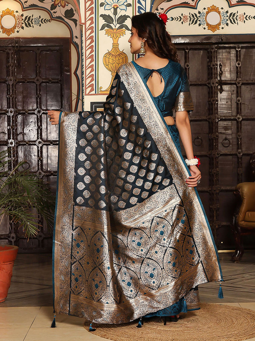 Teal woven kanjivaram soft silk saree with blouse piece