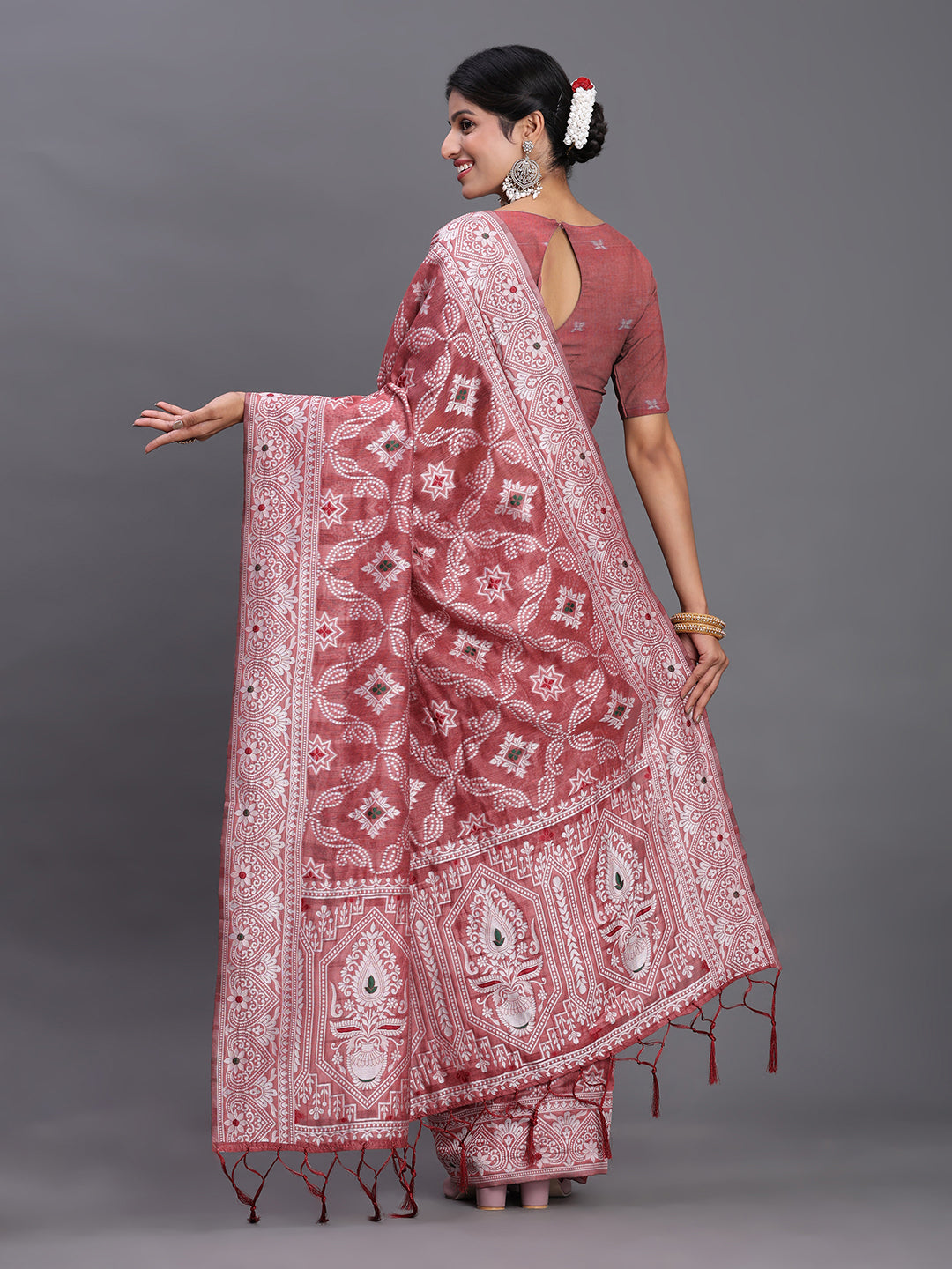 Peach Woven Jacquard Cotton Linen Saree with Intricate Traditional Motifs & Designer Tassel Pallu