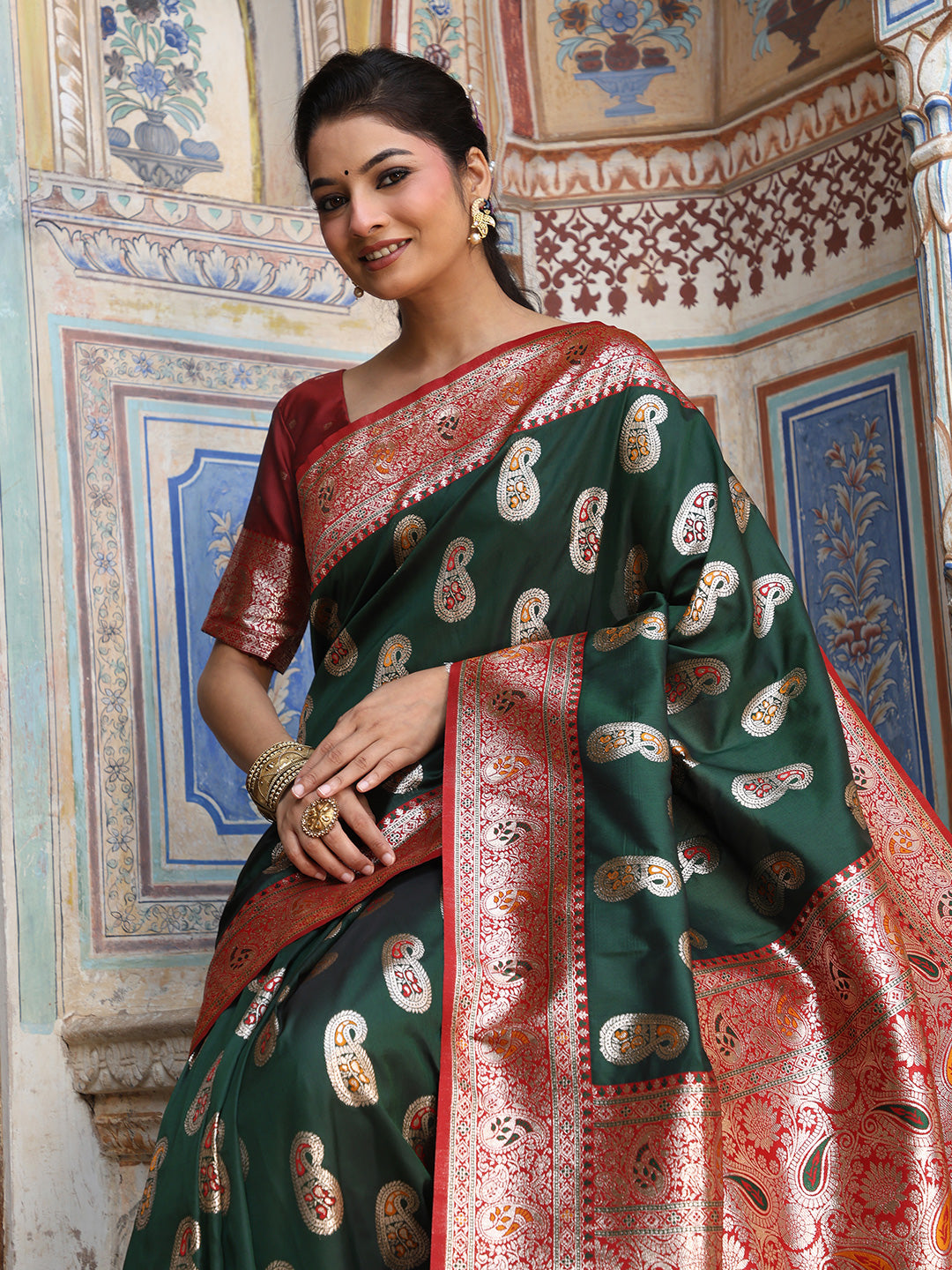 Green woven kanjivaram soft silk saree with blouse piece