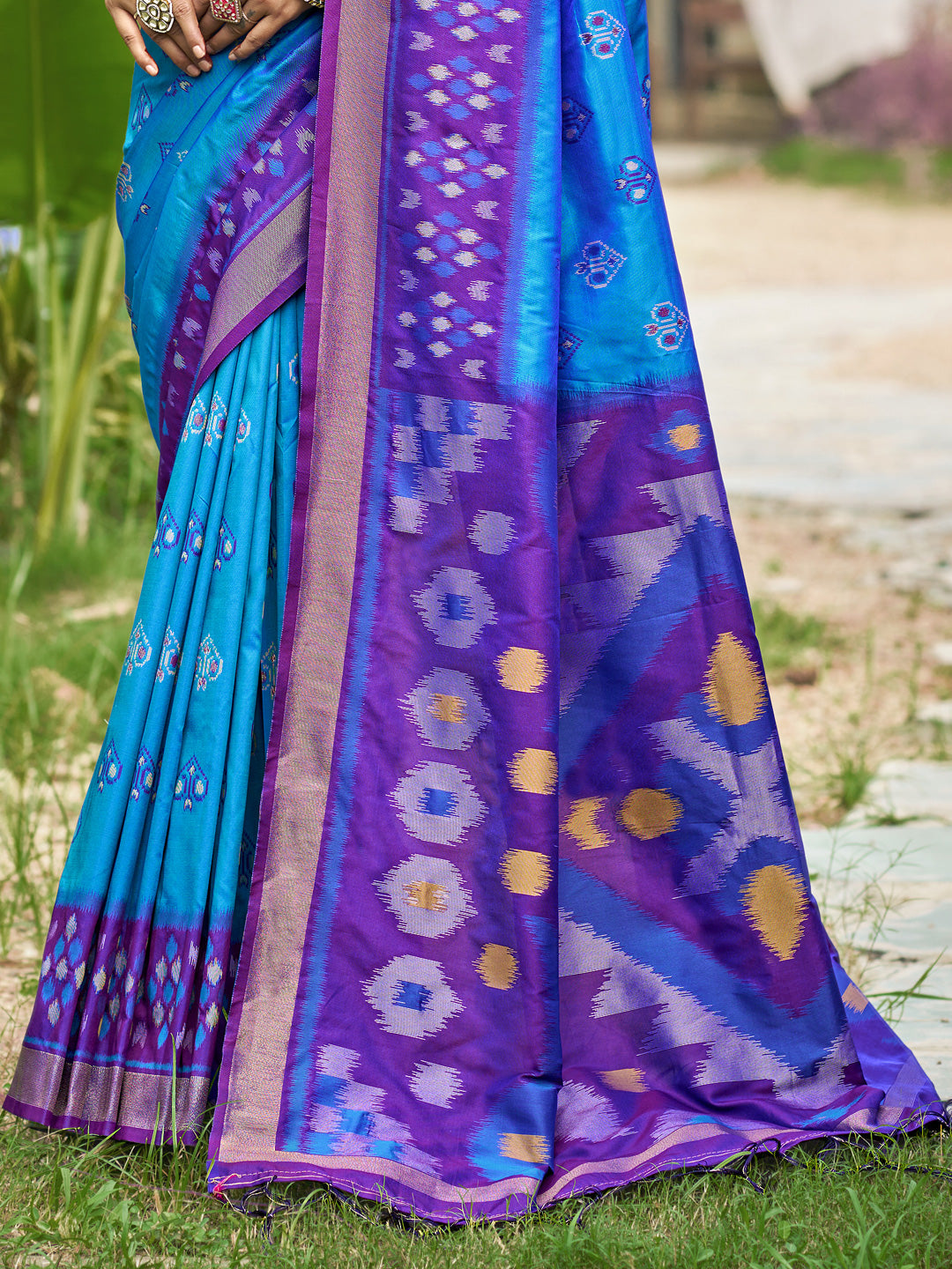 Blue woven ikkat style banarasi soft silk saree with blouse piece