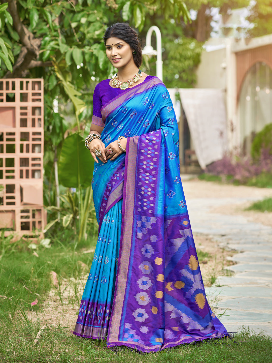 Blue woven ikkat style banarasi soft silk saree with blouse piece
