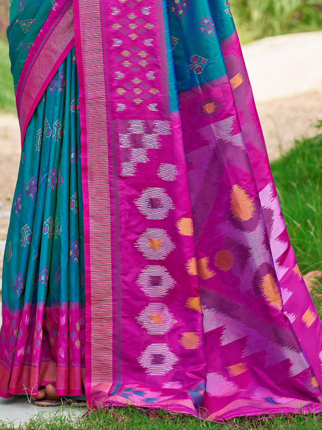 Seagreen woven ikkat style banarasi soft silk saree with blouse piece