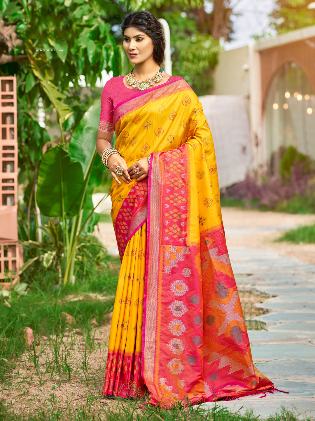 Yellow woven ikkat style banarasi soft silk saree with blouse piece