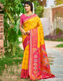 Yellow woven ikkat style banarasi soft silk saree with blouse piece