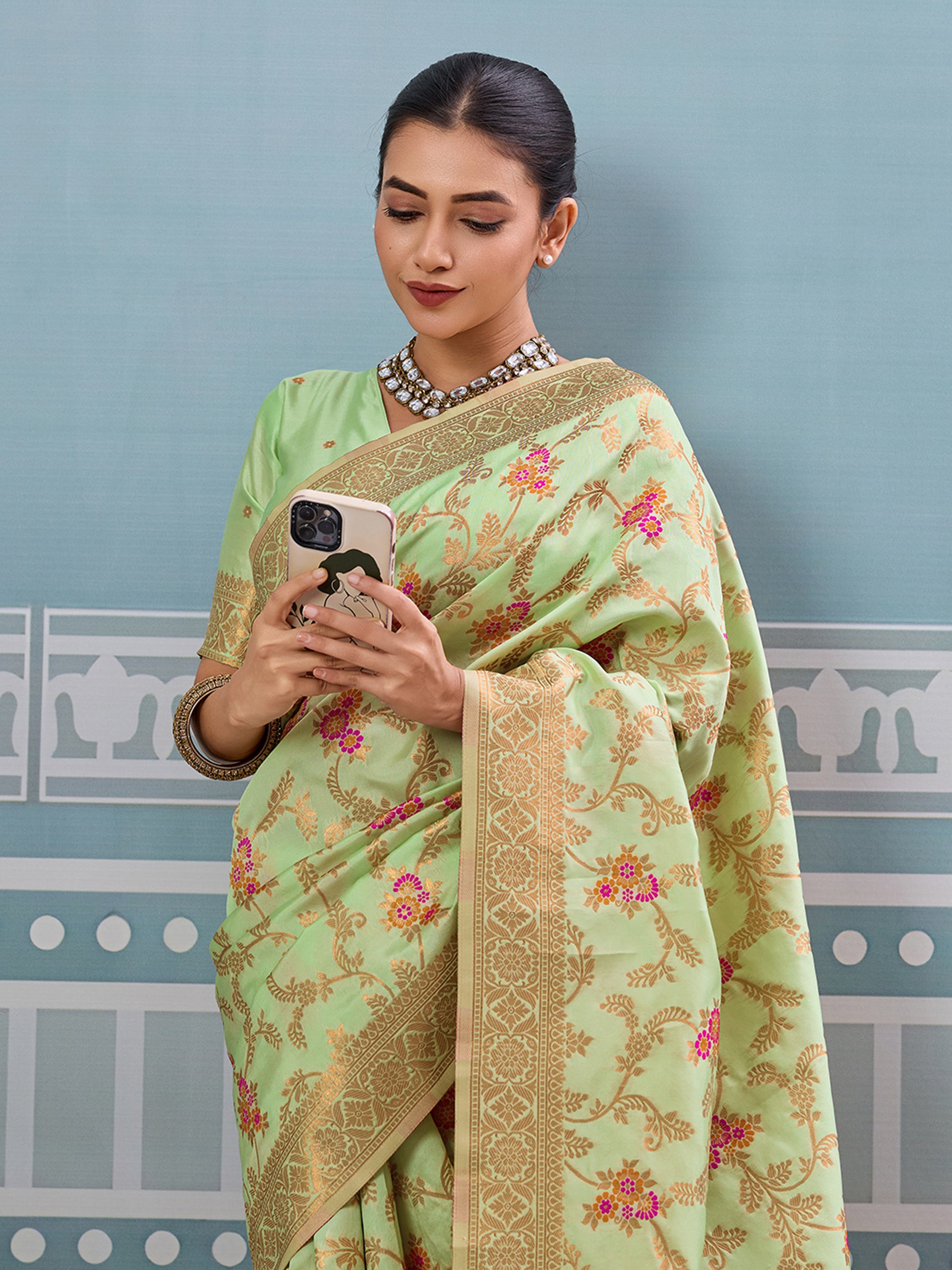 Sea green woven banarasi silk saree with blouse piece