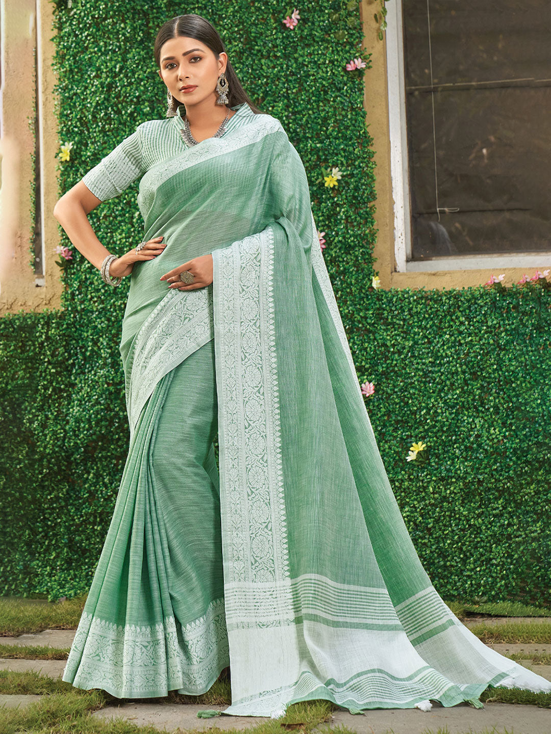 Rama Green woven linen saree with blouse piece