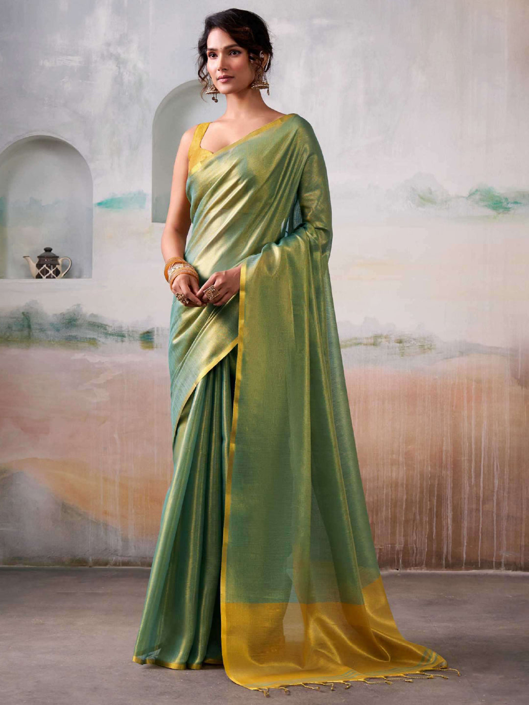 Pastel Green Tissue Silk Saree with Golden Pallu